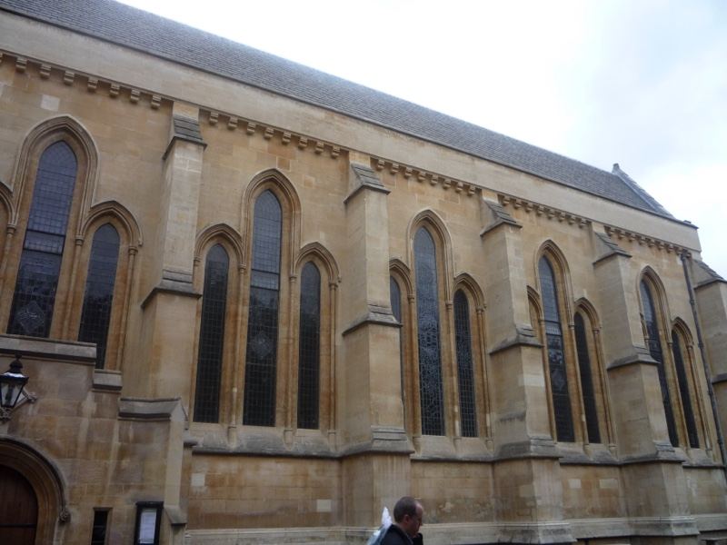 Gothic stone church exterior with tall windows