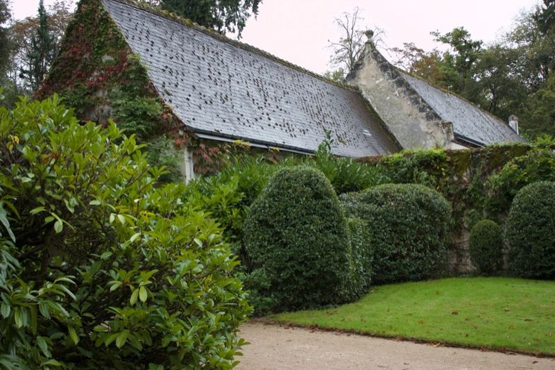 Historic stone cottage with topiary garden