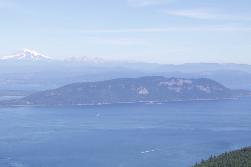 Distant Snow-Capped Mountain Over Island