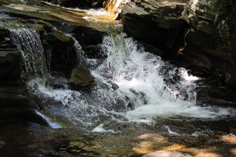 Rocky Waterfall Cascading Over Cliffs