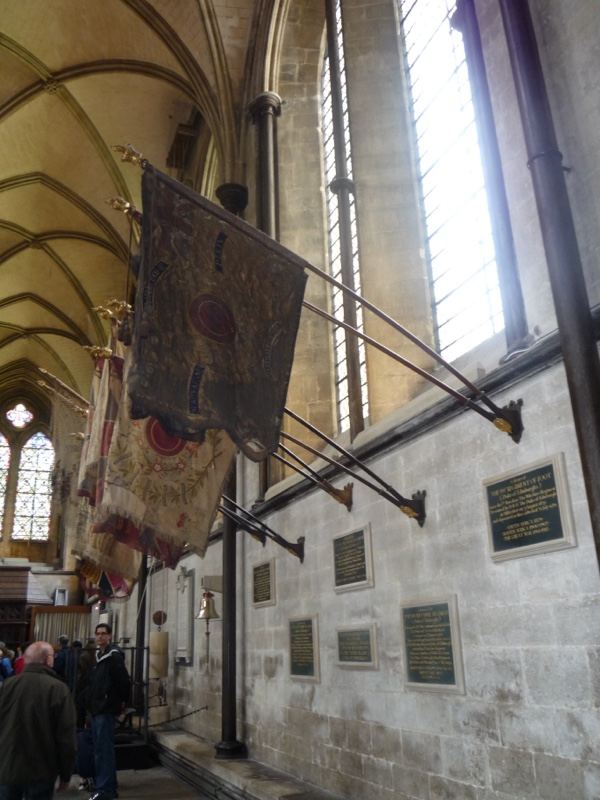 Historic banners in cathedral interior