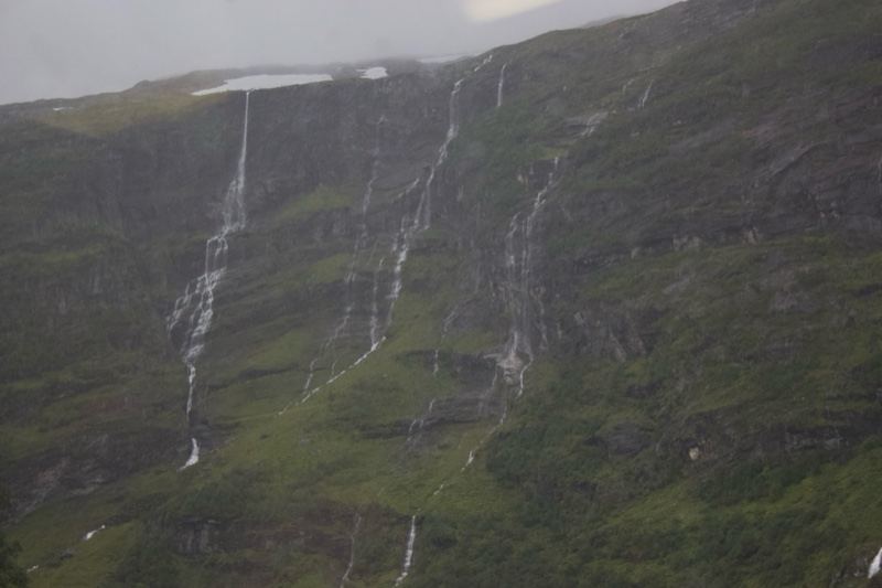 Mountain Waterfalls in Rainy Fjord