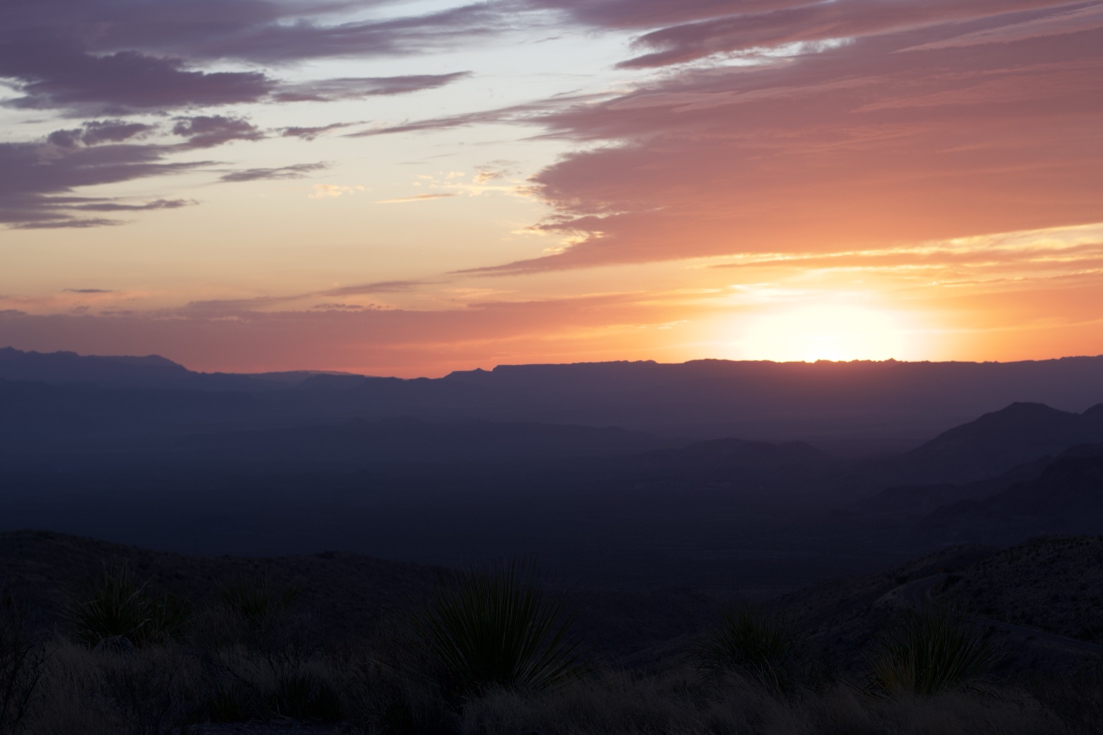 Desert Sunset Over Mountain Range