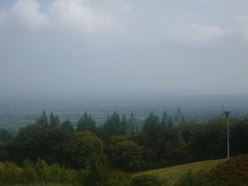 Misty Forested Hills Over Valley