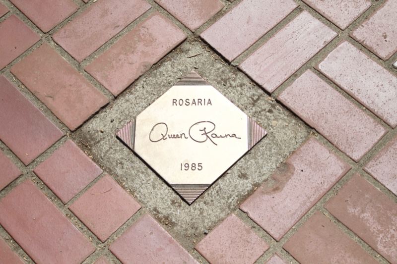 Commemorative plaque in brick pavement
