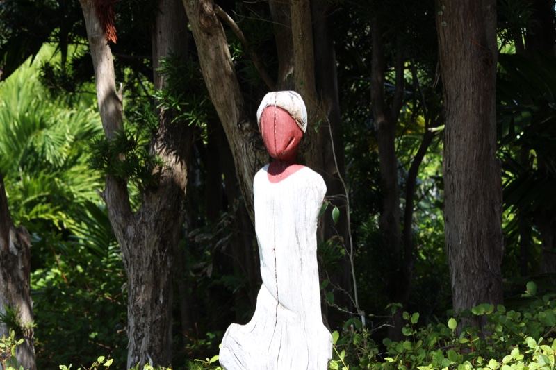 White Statue in Tropical Forest