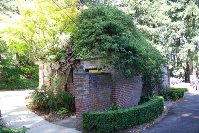 Overgrown Brick Gatehouse in Woods