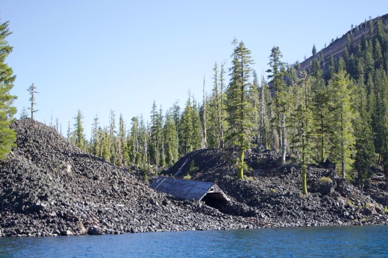 Lake Shore with Rocky Slope and Forest