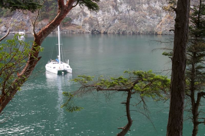 White Catamaran on Turquoise Lake
