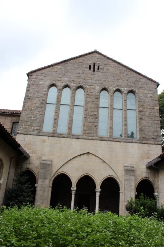 Stone Church Facade With Arched Windows