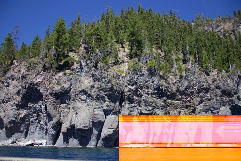 Rocky Cliff with Forest Overlooking Lake
