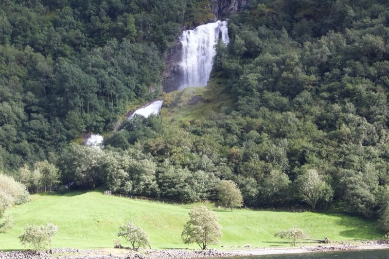 Waterfall Cascading Down Forested Mountain