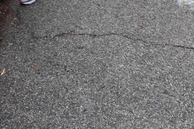 Cracked Asphalt Pavement Close-up
