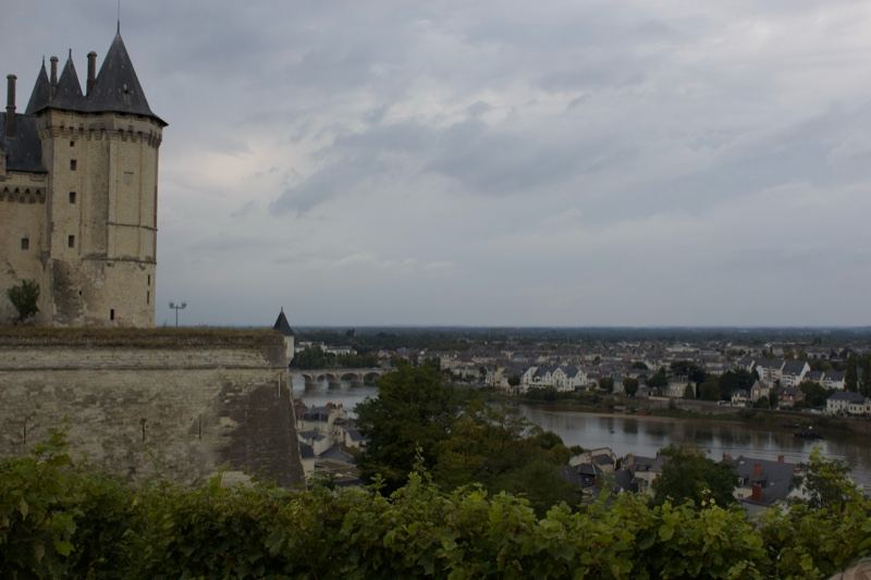 Castle Tower Over River Town View