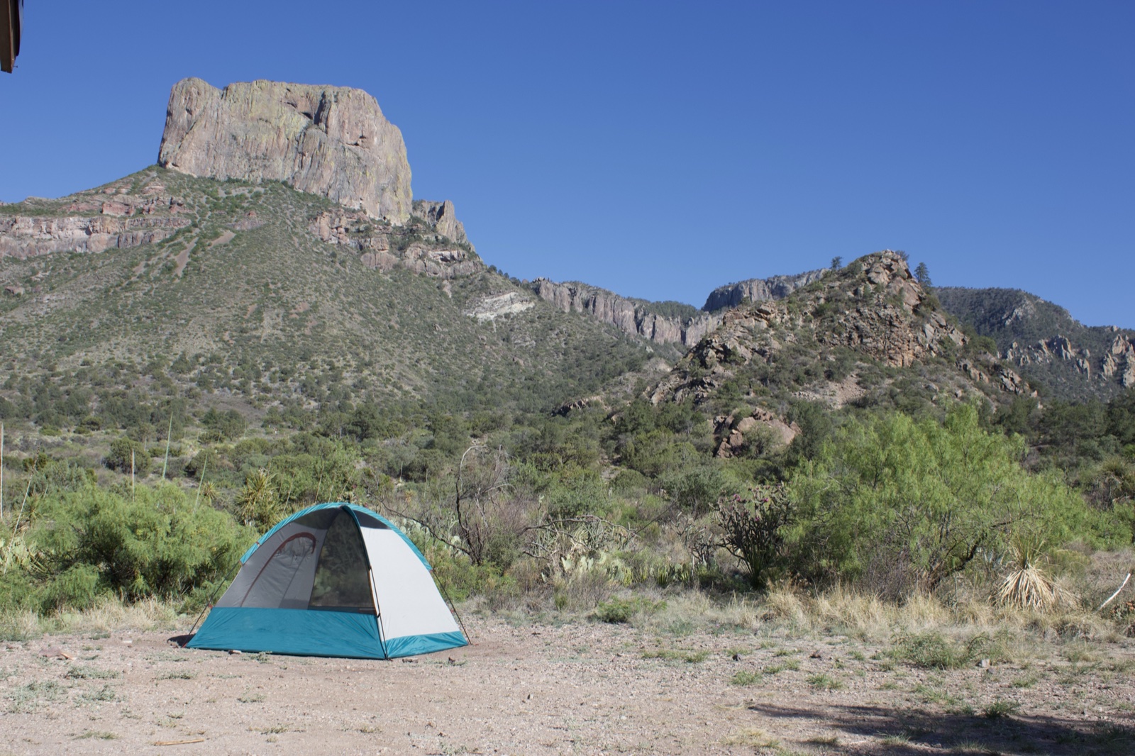 Camping Tent Under Desert Peak