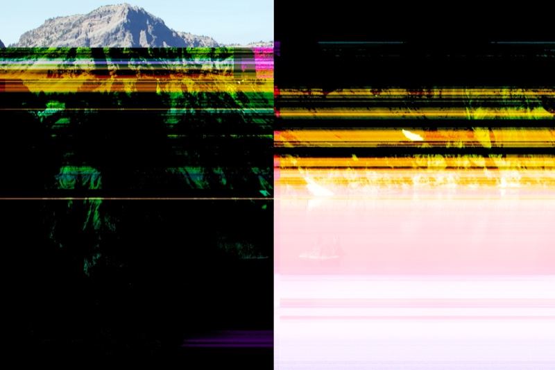 Glitched Mountain Landscape with Color Artifacts