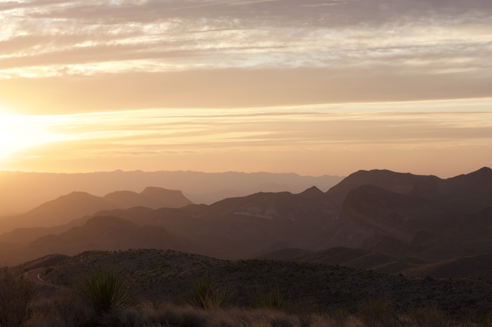 Desert Sunset Over Mountain Range