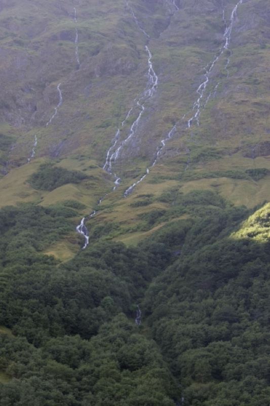 Mountain Slope With Cascading Streams