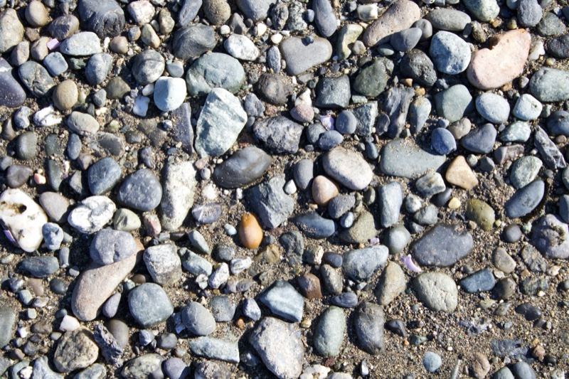 Smooth Multicolored Pebbles on Ground