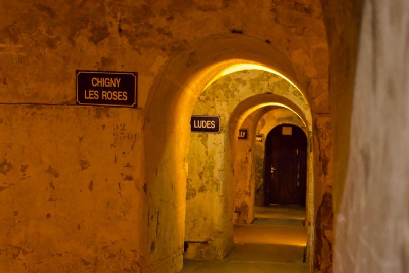 Underground Arched Tunnel with Signs