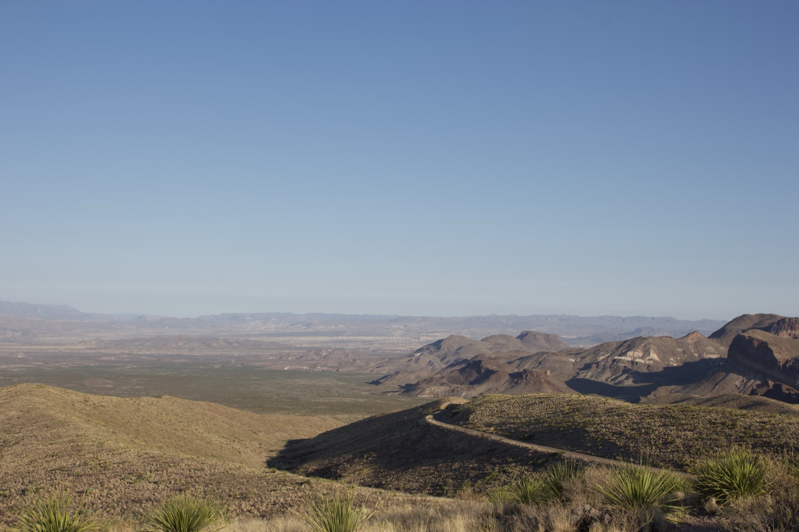 Desert Valley With Winding Road