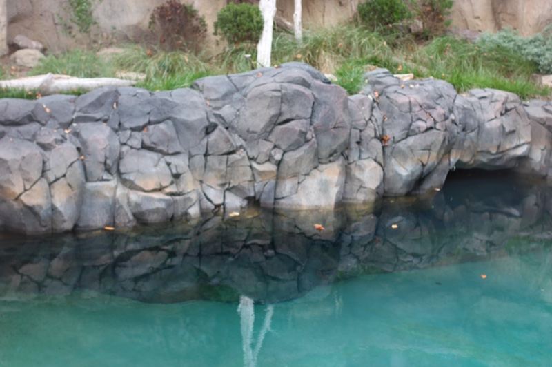 Rocky Edge Over Turquoise Pool