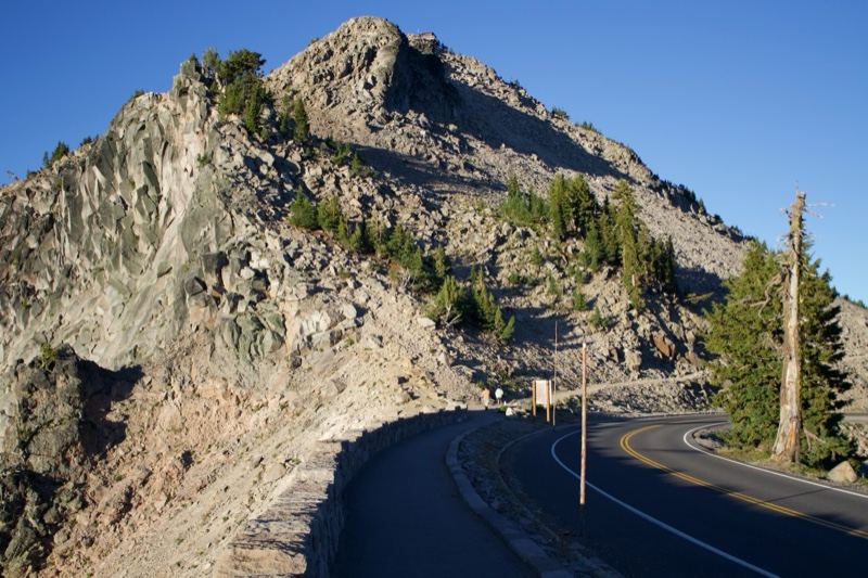 Mountain Road Winding Around Rocky Peak