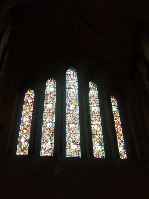 Stained Glass Windows in Dark Church Interior