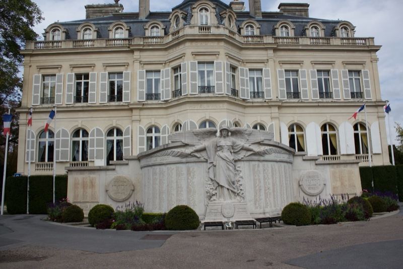 Ornate French Chateau with Fountain Statue