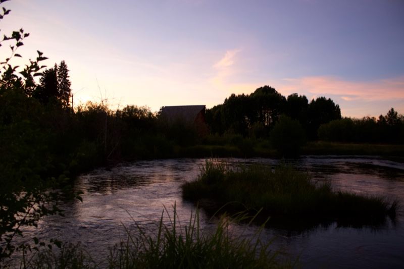 River at Twilight with Silhouetted Trees