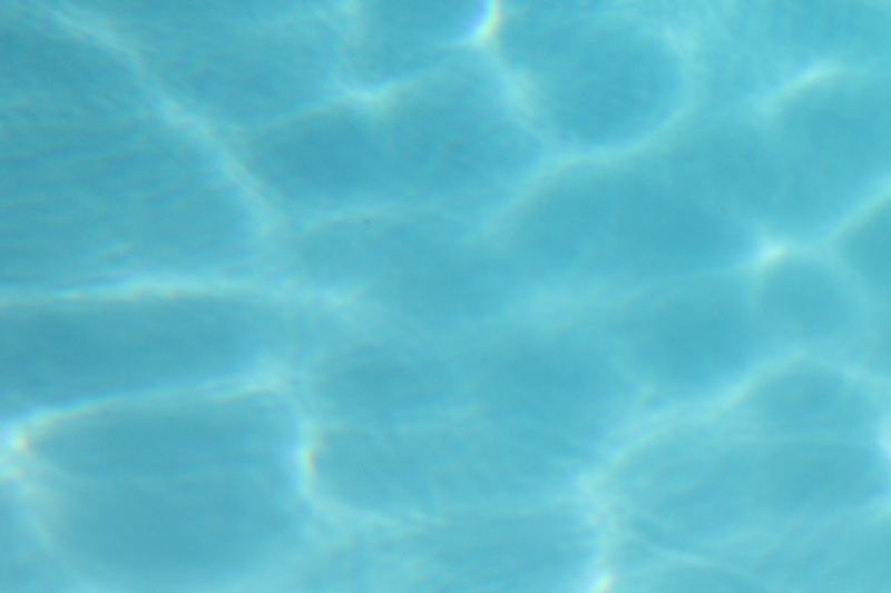 Turquoise Water Surface Ripples