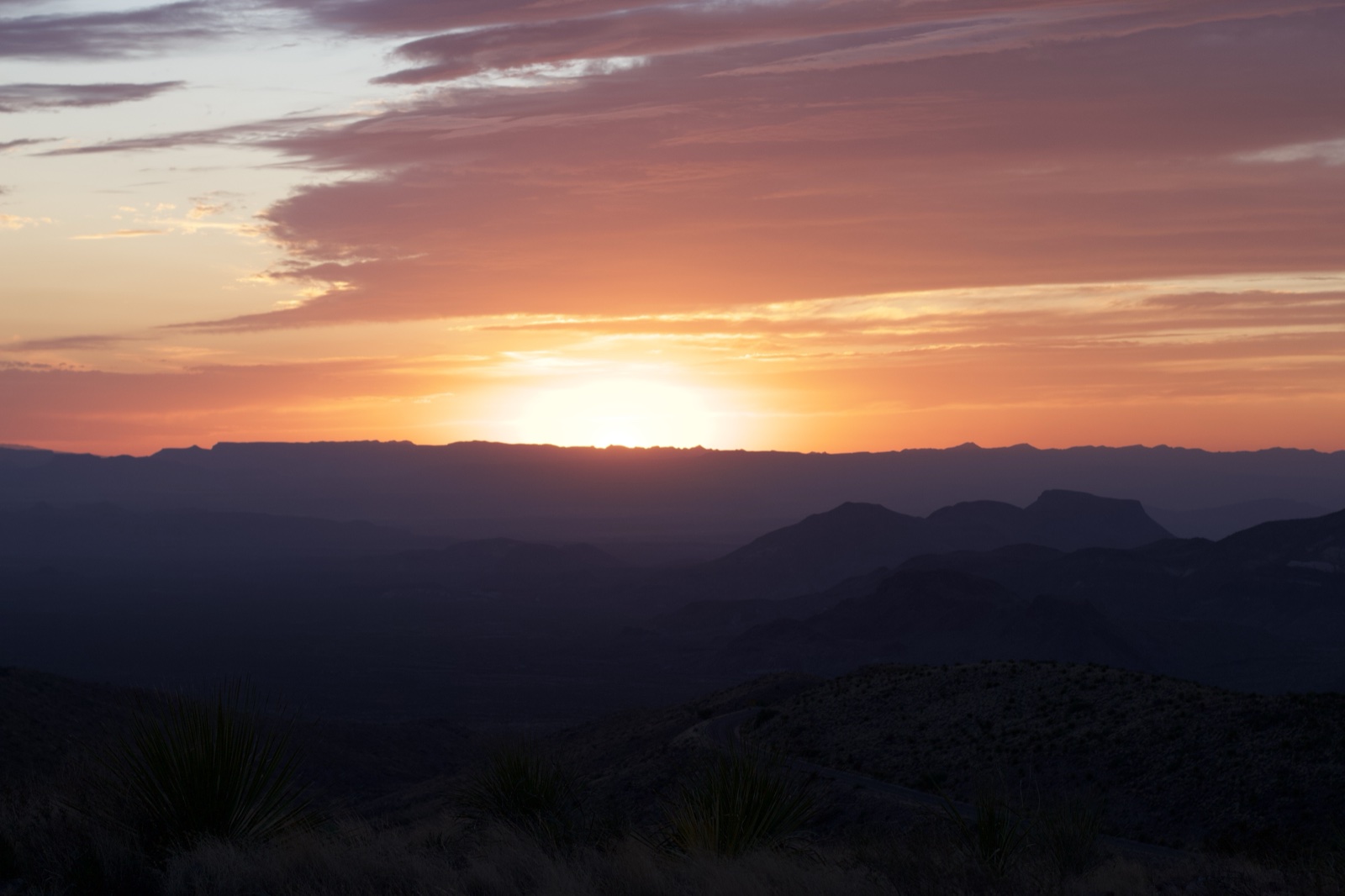 Desert Sunset Over Mountain Range