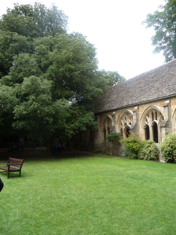 Gothic cloister courtyard with lawn