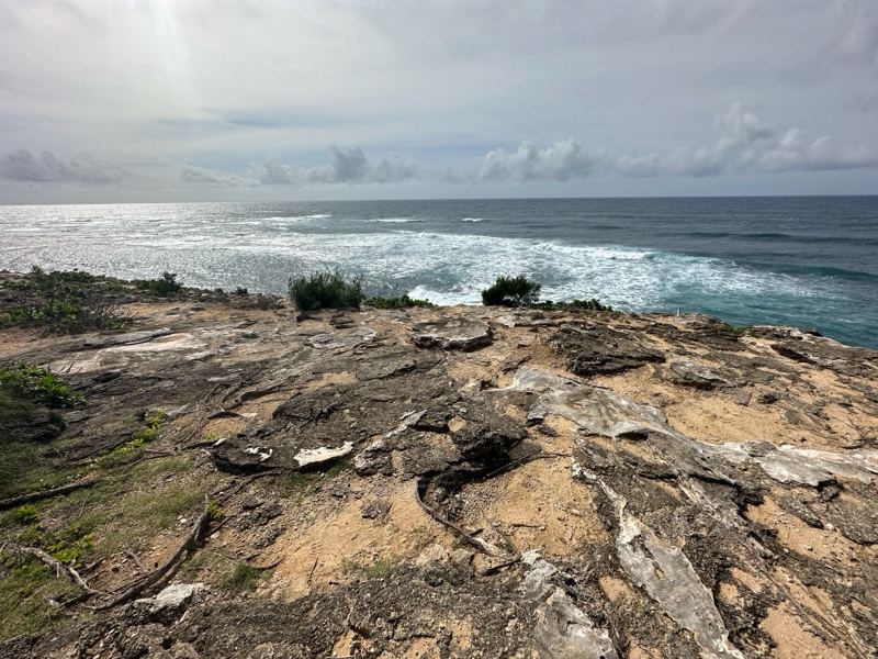 Rugged Rocky Coastline Over Ocean Waves