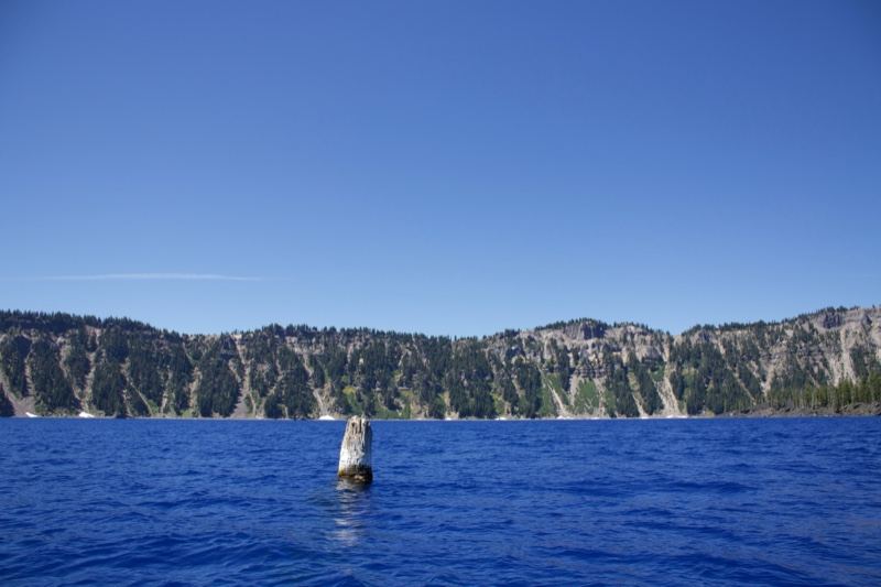 Crater Lake Caldera with Stump in Water