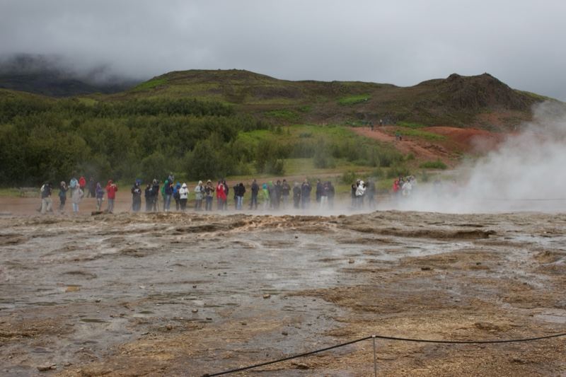 Tourists at Geyser in Iceland