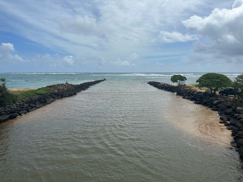Coastal Inlet Between Rock Breakwaters