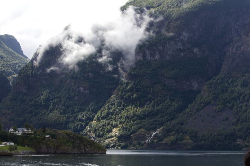 Fjord Mountains With Low Clouds
