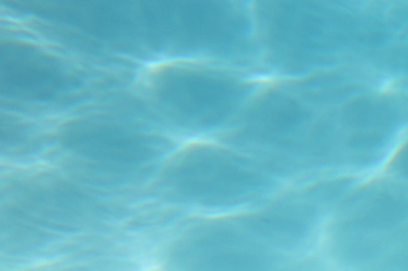 Turquoise Water Surface Ripples