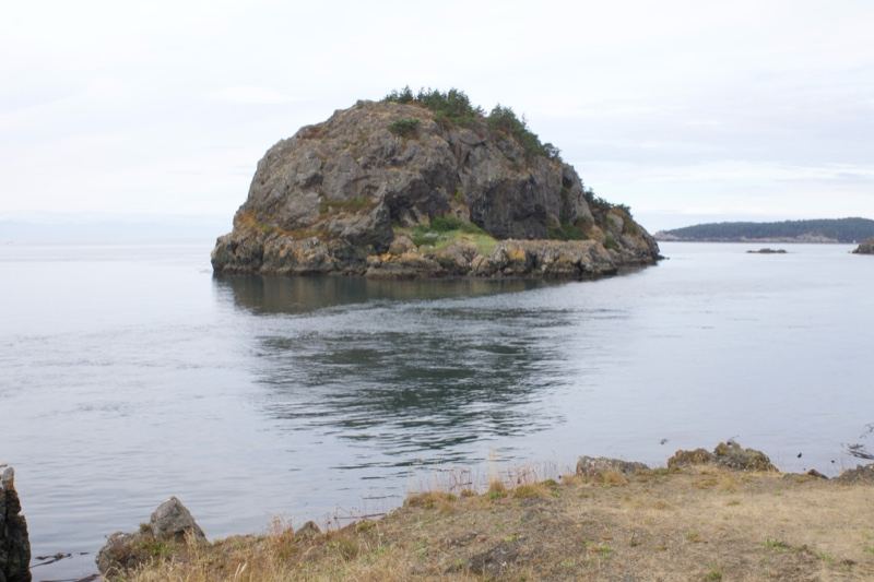 Rocky Islet in Calm Coastal Waters
