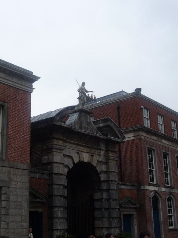 Historic Brick Gate with Statue