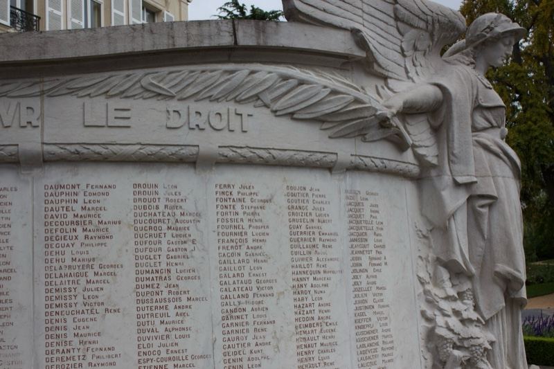 War Memorial Stone Monument with Names