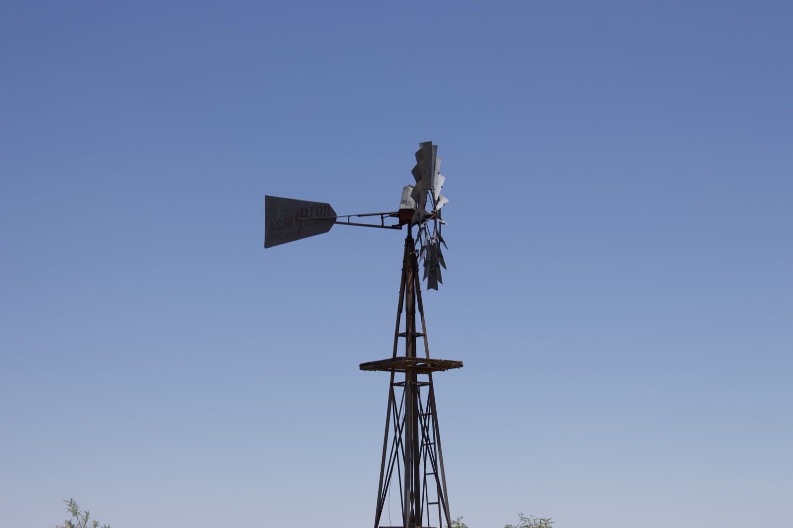 Windmill Against Clear Blue Sky