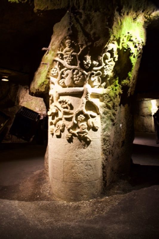 Carved stone pillar in underground chamber