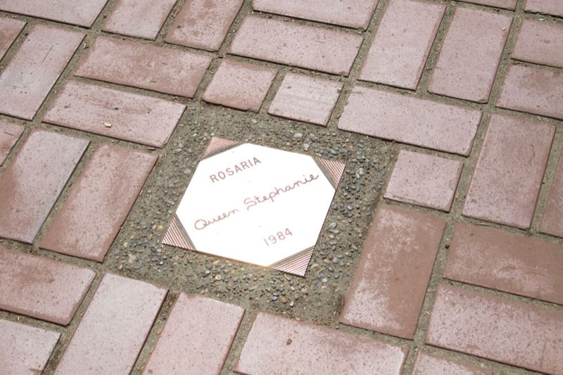 Commemorative plaque in brick pavement