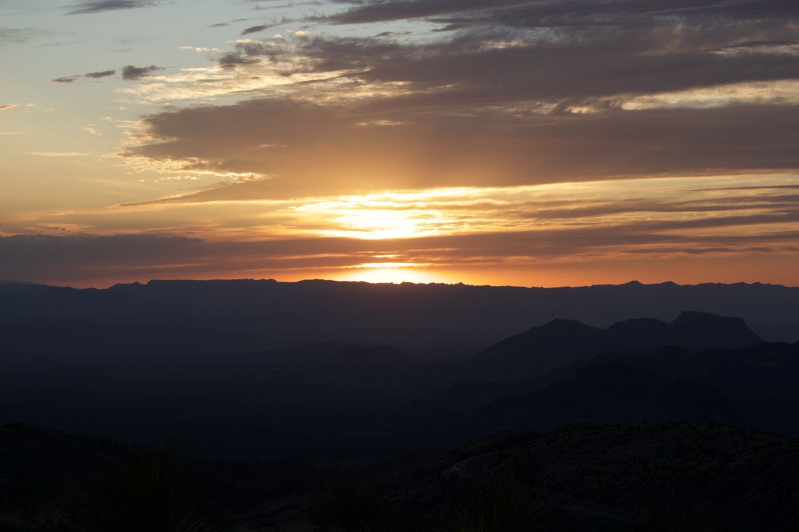 Sunset Over Mountain Silhouette