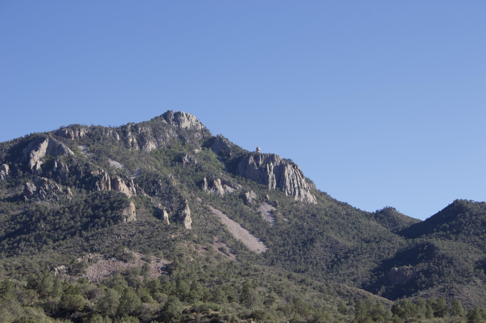 Rugged Mountain Peak Under Clear Sky
