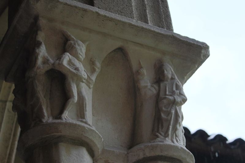 Stone Carved Figures on Column