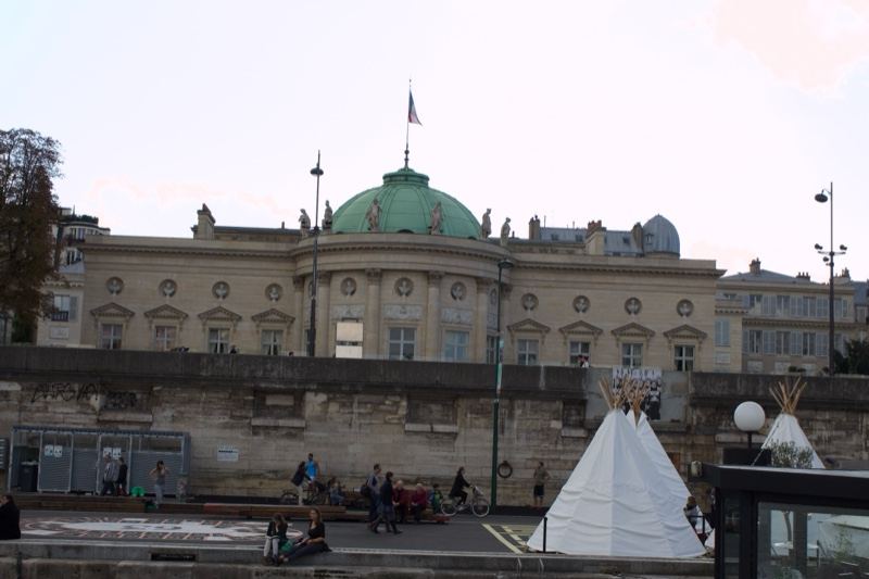 Palace with green dome by river