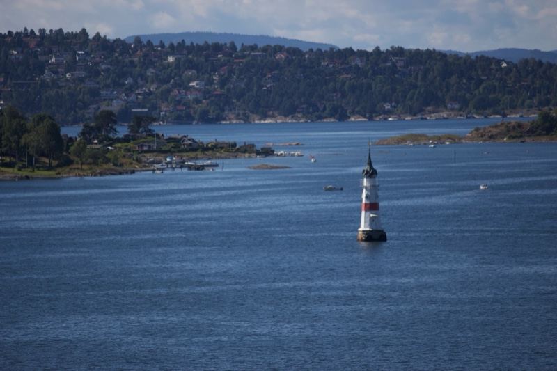 Lighthouse Buoy on Calm Water